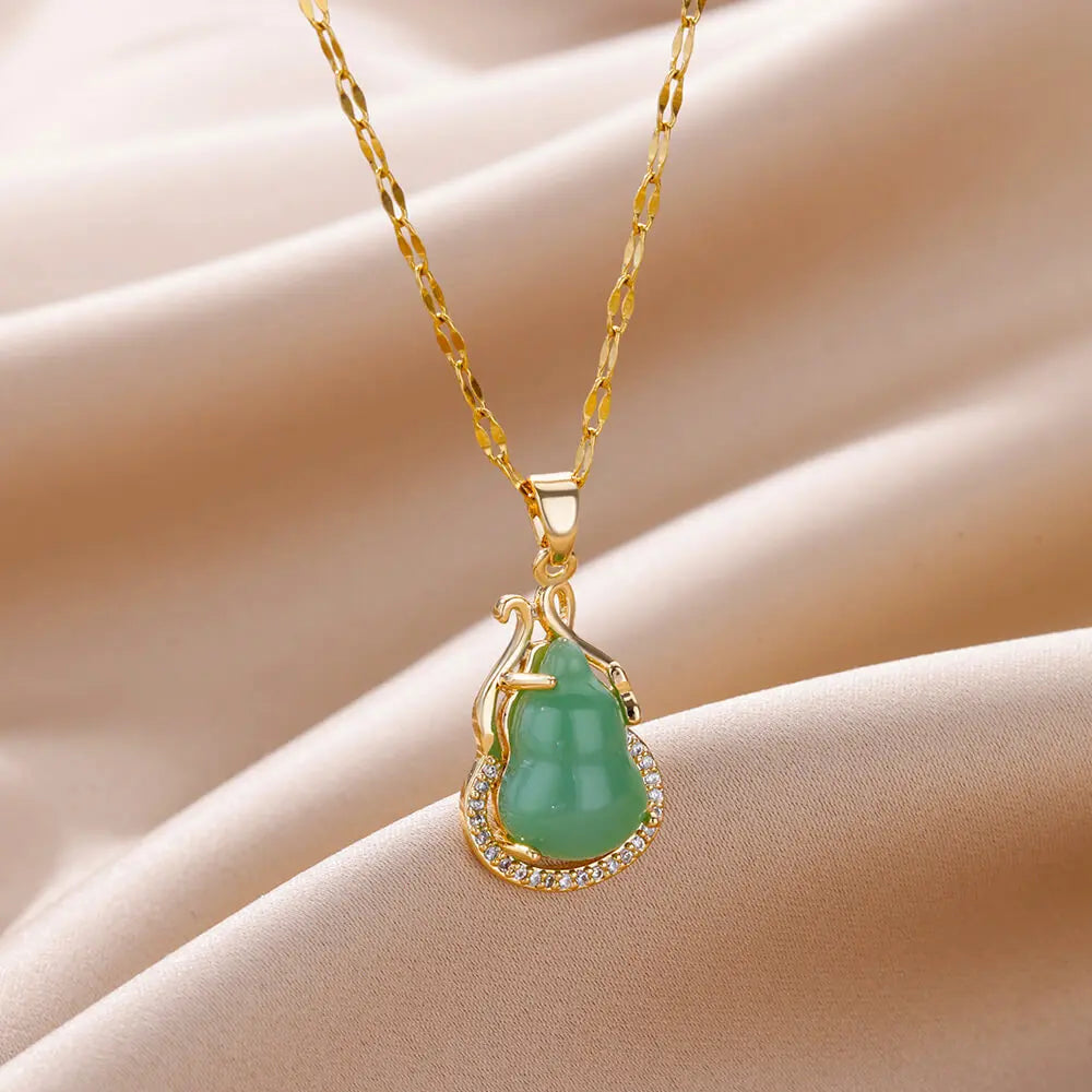 Opulent Opal Oval Necklace: Women's stainless steel, gold-colored pendant. Perfect for weddings, a chic jewelry gift with aesthetic allure. Yoga Shop 2018